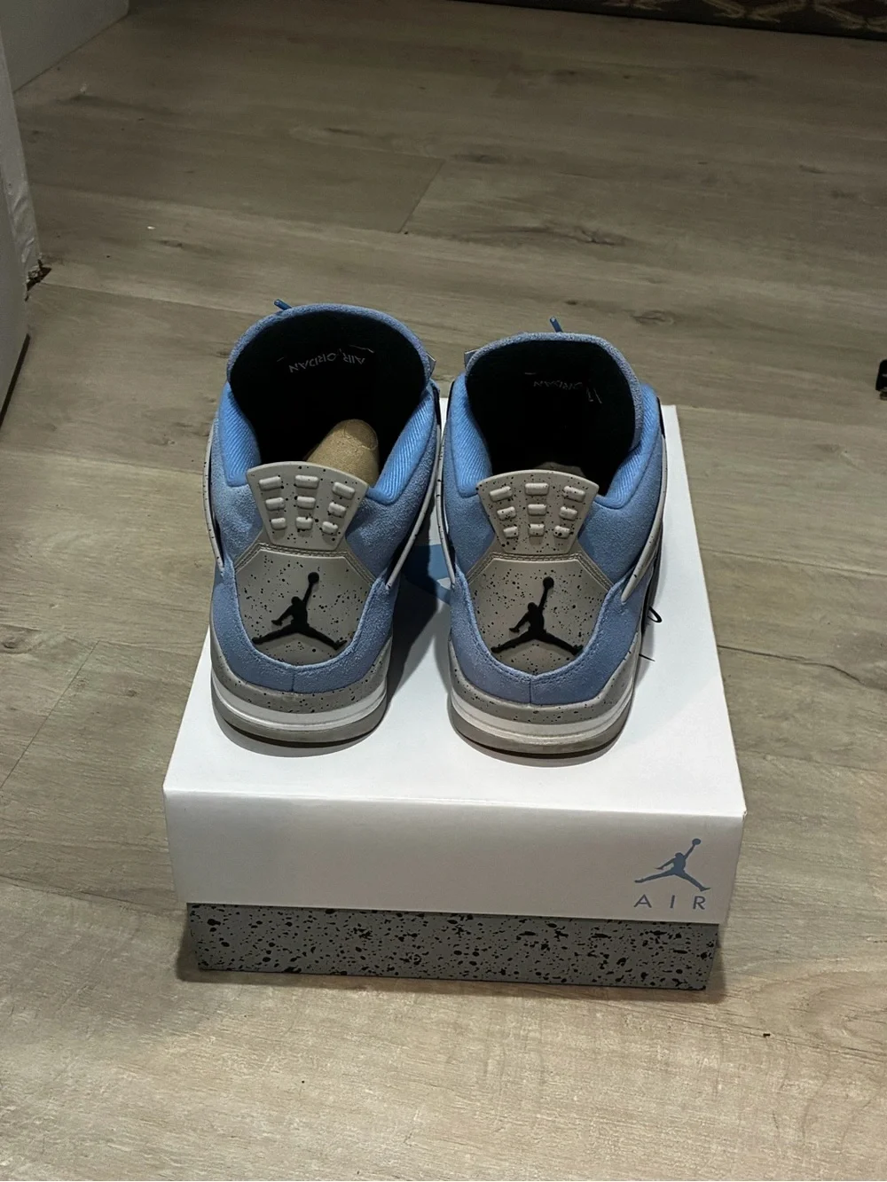 Air Jordan 4 UNC Men’s Athletic Shoes - Light Blue and Black